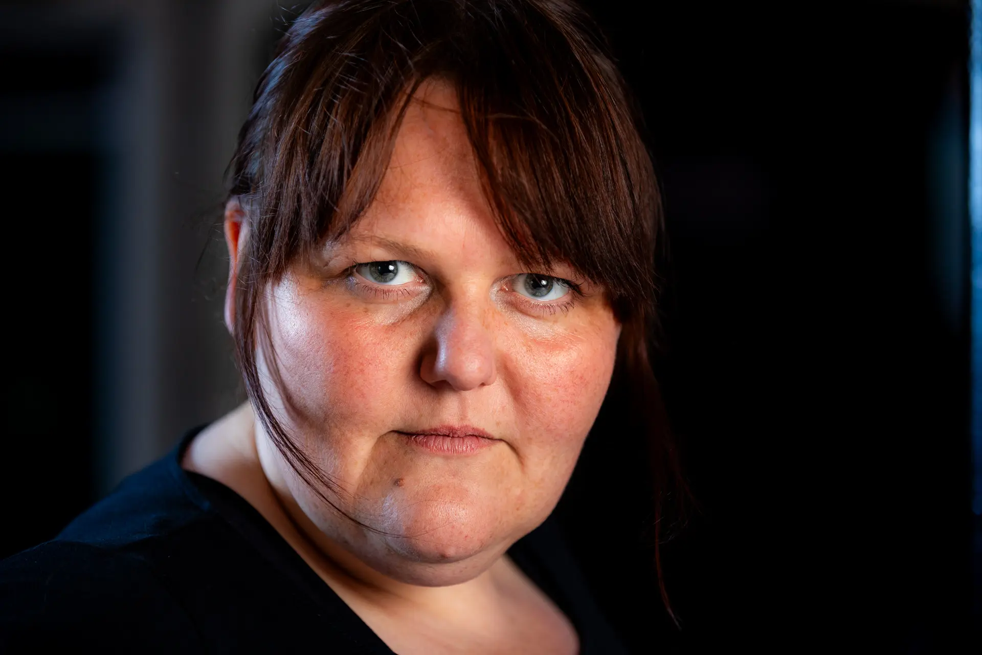 Professional headshot of Laura Guest, captured by Fourth Wall Photography in Norfolk, with soft lighting and a neutral background.